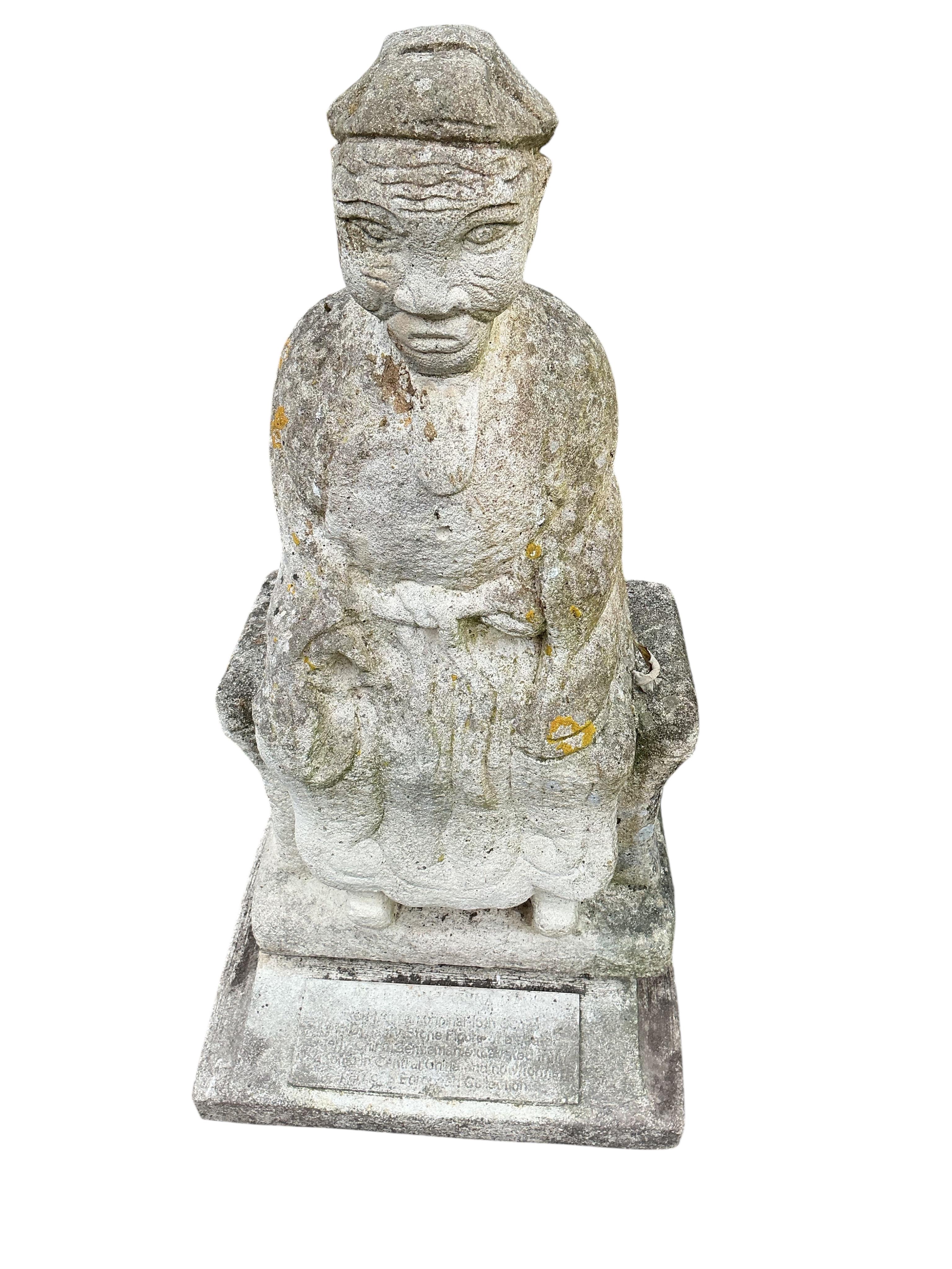 Two reconstituted stone Asian figure garden ornaments, larger height 84cm